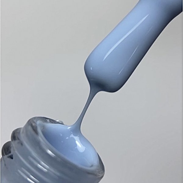Pale blue gel polish on an application brush