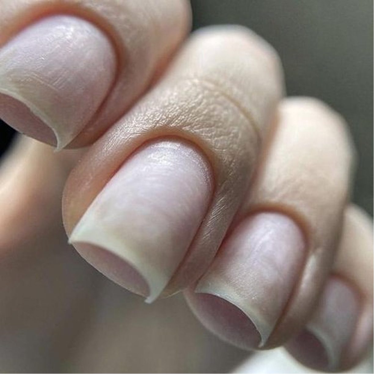 Clean natural nails with a sharp cuticle line after e-file prep